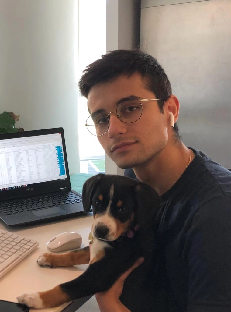 David Koleski holding a puppy